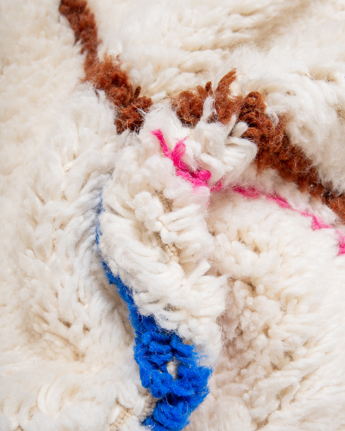 Modern, designer, handcrafted Berber rug from Morocco. Beniourain carpet with beautiful colours and patterns and fluffy wool texture.